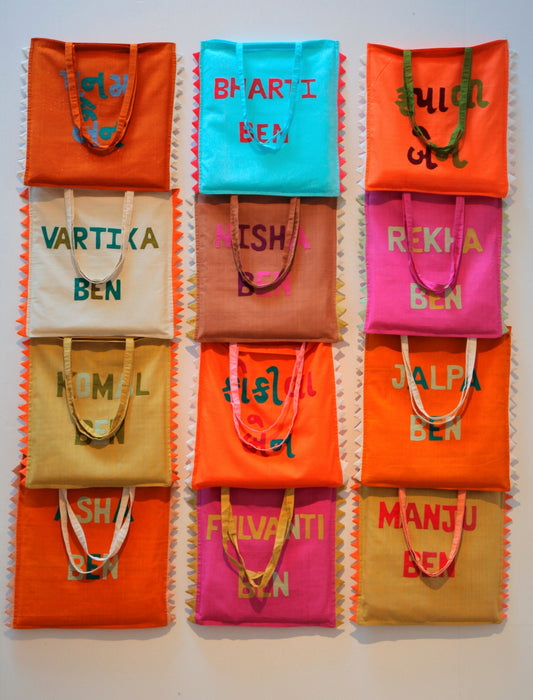 "Signature Bags, Ahmedabad" ( 34 x 40cm x 9 bags )(w x h) Hand-made tote bags created in partnership with Katab, Khadi cloth and applique